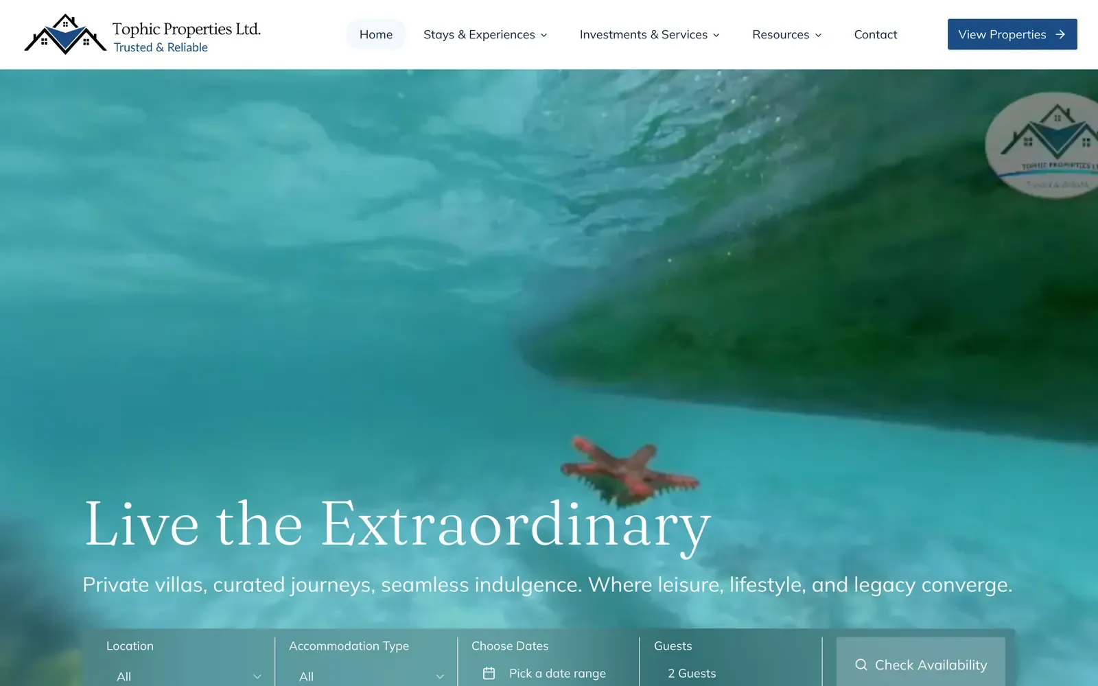 Tophic Properties home page with the headline Live the Extraordinary